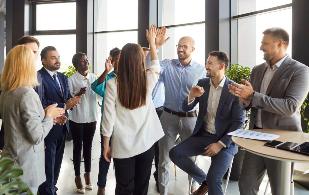 Friendly,Happy,Diverse,Employees,Congratulating,With,Great,Business,Achievement,,Good